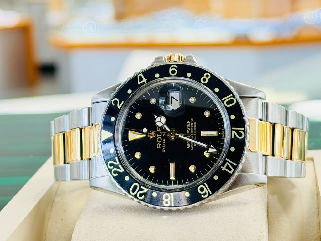 Rolex GMT-Master 40 1675  Stainless & Gold Oyster Black Dial  Vintage 5 Million Serial PreOwned - Diamonds East Intl.