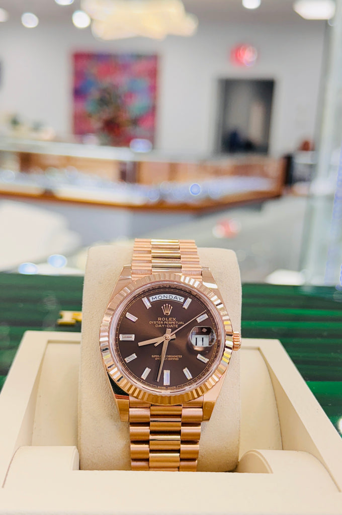 PreOwned Rolex Day-Date 40mm Everrose Gold 228235 Factory Chocolate Baguette Dial Box/Papers - Diamonds East Intl.