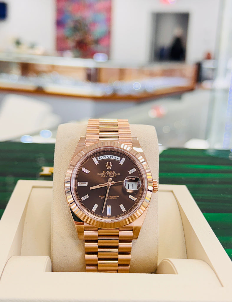 PreOwned Rolex Day-Date 40mm Everrose Gold 228235 Factory Chocolate Baguette Dial Box/Papers - Diamonds East Intl.
