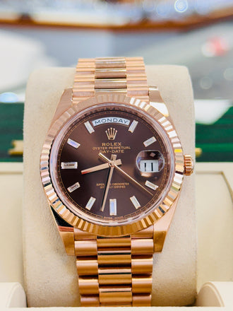 PreOwned Rolex Day-Date 40mm Everrose Gold 228235 Factory Chocolate Baguette Dial Box/Papers - Diamonds East Intl.