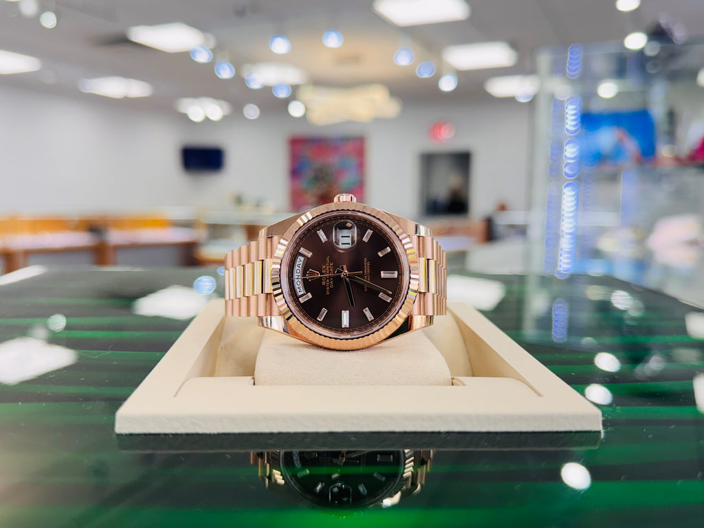 PreOwned Rolex Day-Date 40mm Everrose Gold 228235 Factory Chocolate Baguette Dial Box/Papers - Diamonds East Intl.