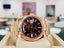 PreOwned Rolex Day-Date 40mm Everrose Gold 228235 Factory Chocolate Baguette Dial Box/Papers - Diamonds East Intl.