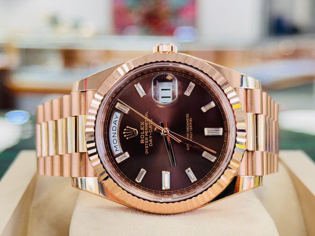 PreOwned Rolex Day-Date 40mm Everrose Gold 228235 Factory Chocolate Baguette Dial Box/Papers - Diamonds East Intl.