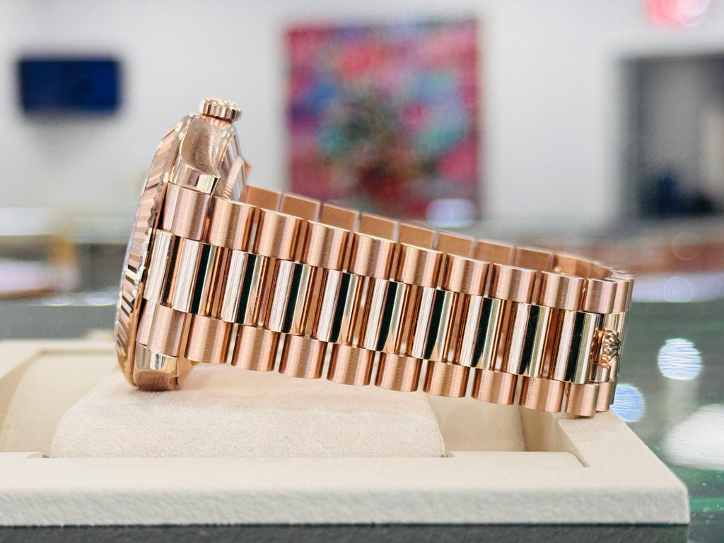 PreOwned Rolex Day-Date 40mm Everrose Gold 228235 Factory Chocolate Baguette Dial Box/Papers - Diamonds East Intl.