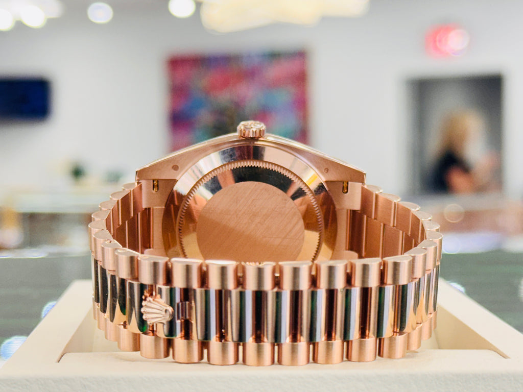 PreOwned Rolex Day-Date 40mm Everrose Gold 228235 Factory Chocolate Baguette Dial Box/Papers - Diamonds East Intl.