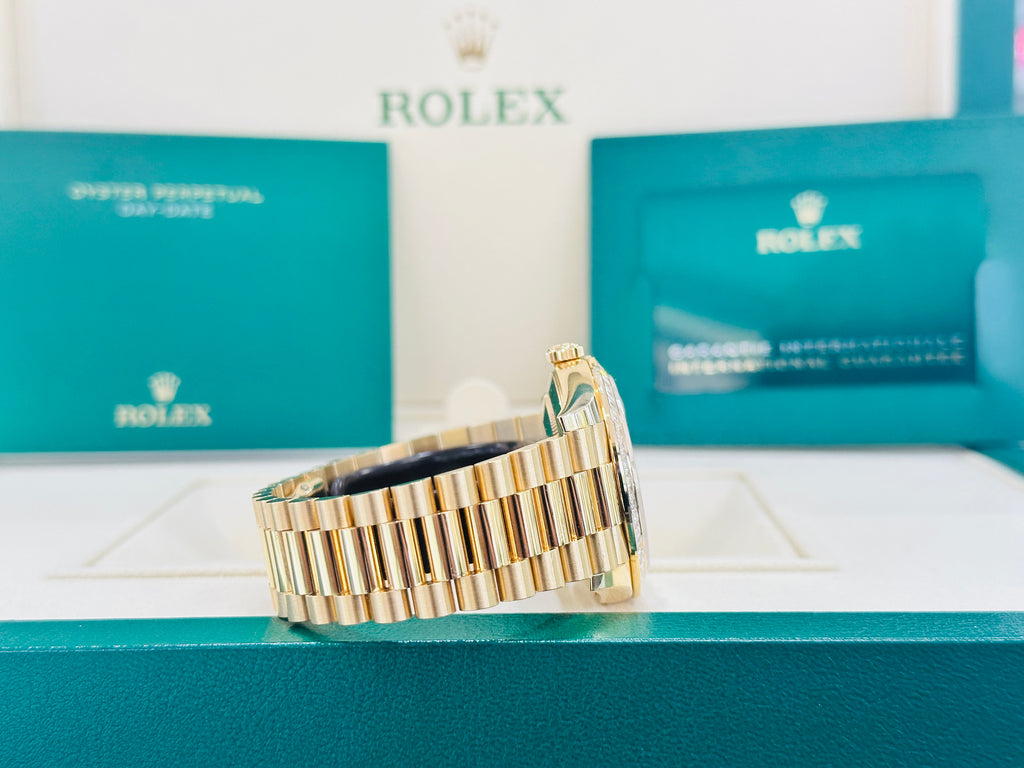 Rolex Day-Date 40 Yellow Gold Baguette Yellow gold Bezel  Factory Baguette Diamond Champagne Dial 228398TBR Box and Papers - Diamonds East Intl.