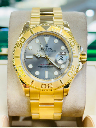 Rolex Yacht master 16628 40 Bezel Engraved Yellow Gold Grey Dial PreOwned - Diamonds East Intl.