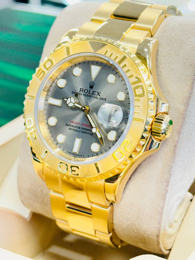 Rolex Yacht master 16628 40 Bezel Engraved Yellow Gold Grey Dial PreOwned - Diamonds East Intl.