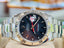 Rolex Datejust 116264 Turn-O-Graph Black Dial  Steel 18K Gold Bezel  PreOwned Box & Papers - Diamonds East Intl.