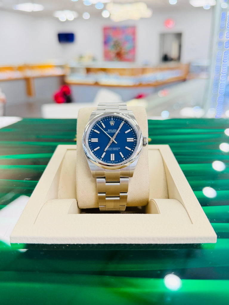 Rolex Oyster Perpetual 41 134300  Mediterranean Blue Dial  Box and Papers Unworn - Diamonds East Intl.