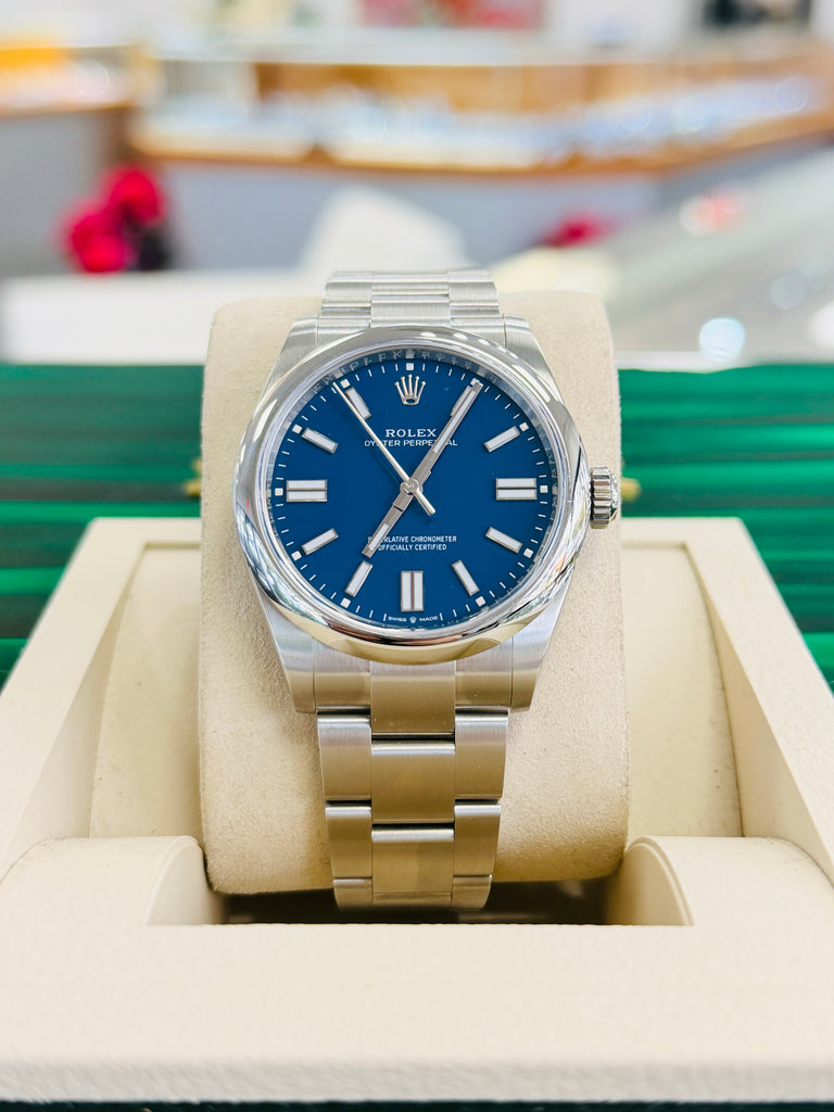 Rolex Oyster Perpetual 41 134300  Mediterranean Blue Dial  Box and Papers Unworn - Diamonds East Intl.