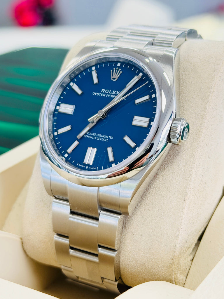 Rolex Oyster Perpetual 41 134300  Mediterranean Blue Dial  Box and Papers Unworn - Diamonds East Intl.