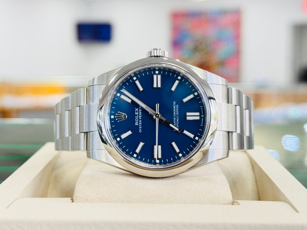 Rolex Oyster Perpetual 41 134300  Mediterranean Blue Dial  Box and Papers Unworn - Diamonds East Intl.