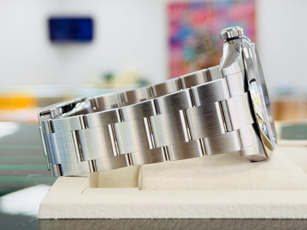 Rolex Oyster Perpetual 41 134300  Mediterranean Blue Dial  Box and Papers Unworn - Diamonds East Intl.