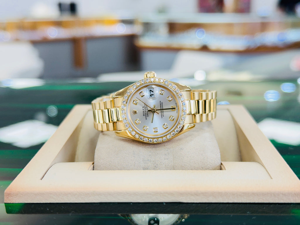 Rolex Lady-Datejust 179178 26 18K Yellow Gold & Custom Diamond Bezel Factory Silver Diamond Dial Box and Papers - Diamonds East Intl.