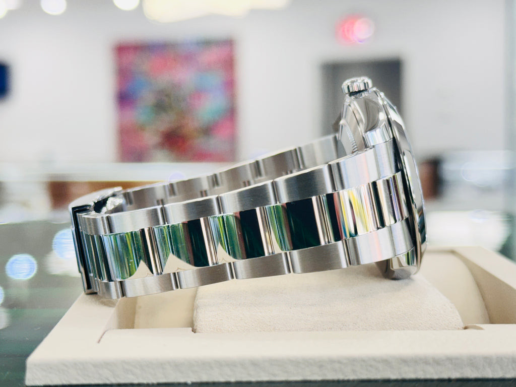 Rolex Datejust 41 126300 Blue Azzurro Roman Dial Stainless Steel Smooth Bezel  Oyster Bracelet Unworn - Diamonds East Intl.