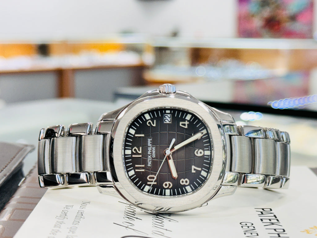 Patek Philippe Aquanaut 5167/1A-001 Stainless Steel Black Arabic Dial 40 mm PreOwned Box and Papers