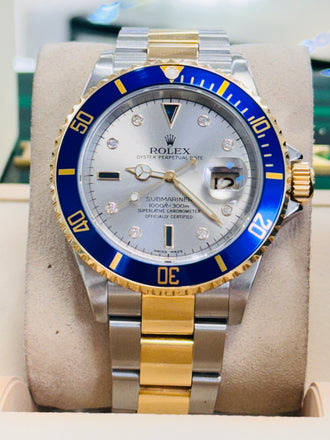 Rolex Submariner Date 16613 Yellow Gold Stainless Steel Oyster Preowned Factory Silver Diamond Serti Dial - Diamonds East Intl.