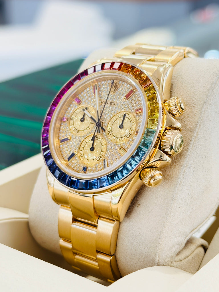 Rolex Daytona 116528 40 18k Yellow Gold Custom Rainbow Bezel Custom Pave Diamonds & Sapphires Dial  PreOwned - Diamonds East Intl.