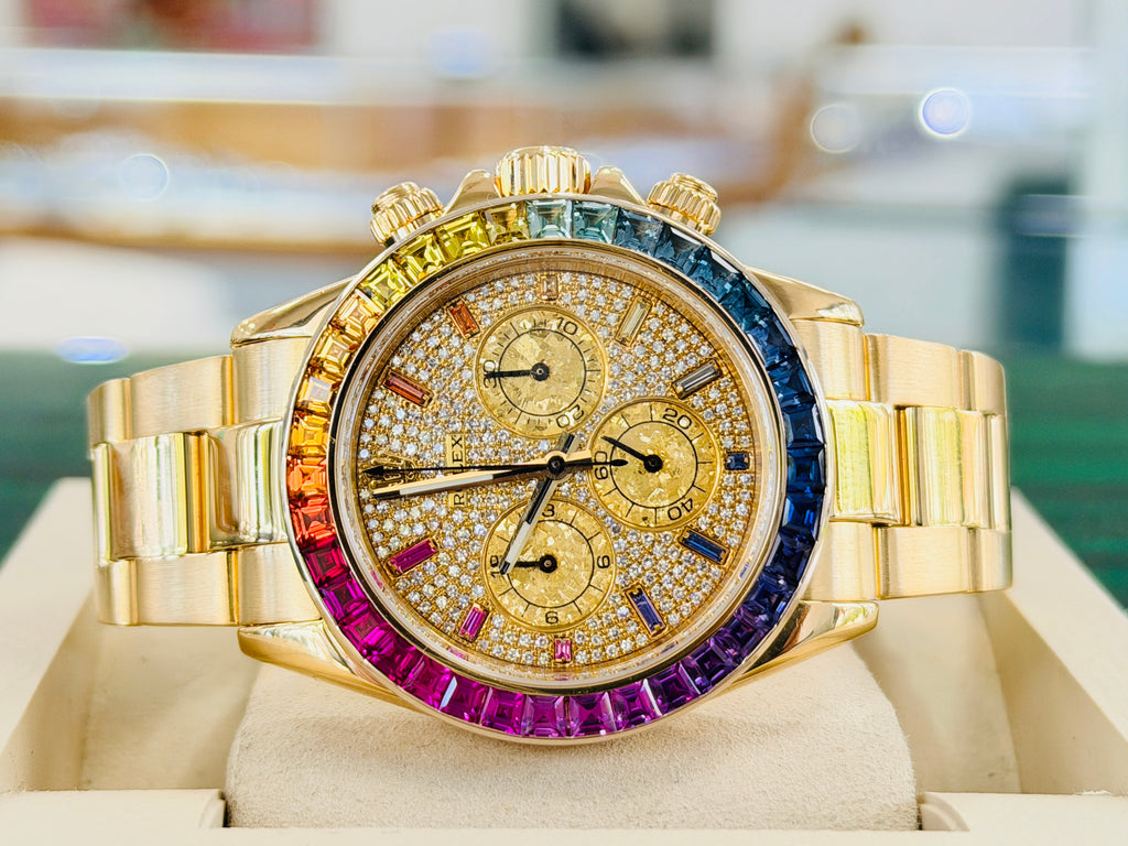 Rolex Daytona 116528 40 18k Yellow Gold Custom Rainbow Bezel Custom Pave Diamonds & Sapphires Dial  PreOwned - Diamonds East Intl.