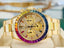 Rolex Daytona 116528 40 18k Yellow Gold Custom Rainbow Bezel Custom Pave Diamonds & Sapphires Dial  PreOwned - Diamonds East Intl.