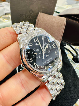 Patek Philippe Annual Calendar 5036/1G Moon Phase w/Power Reserve In 18kt White Gold 37MM PreOw ned - Diamonds East Intl.