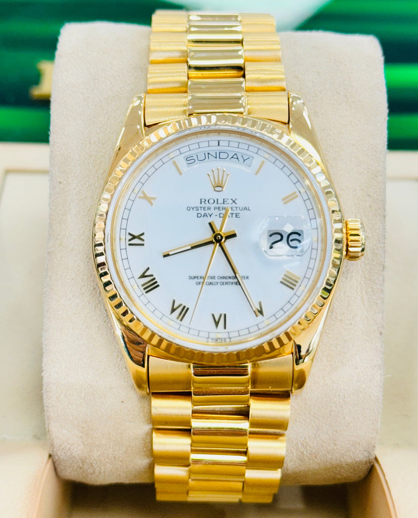 Rolex Day-Date 36 18038  Yellow Gold White Roman Dial PreOwned - Diamonds East Intl.