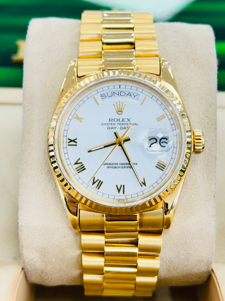 Rolex Day-Date 36 18038  Yellow Gold White Roman Dial PreOwned - Diamonds East Intl.