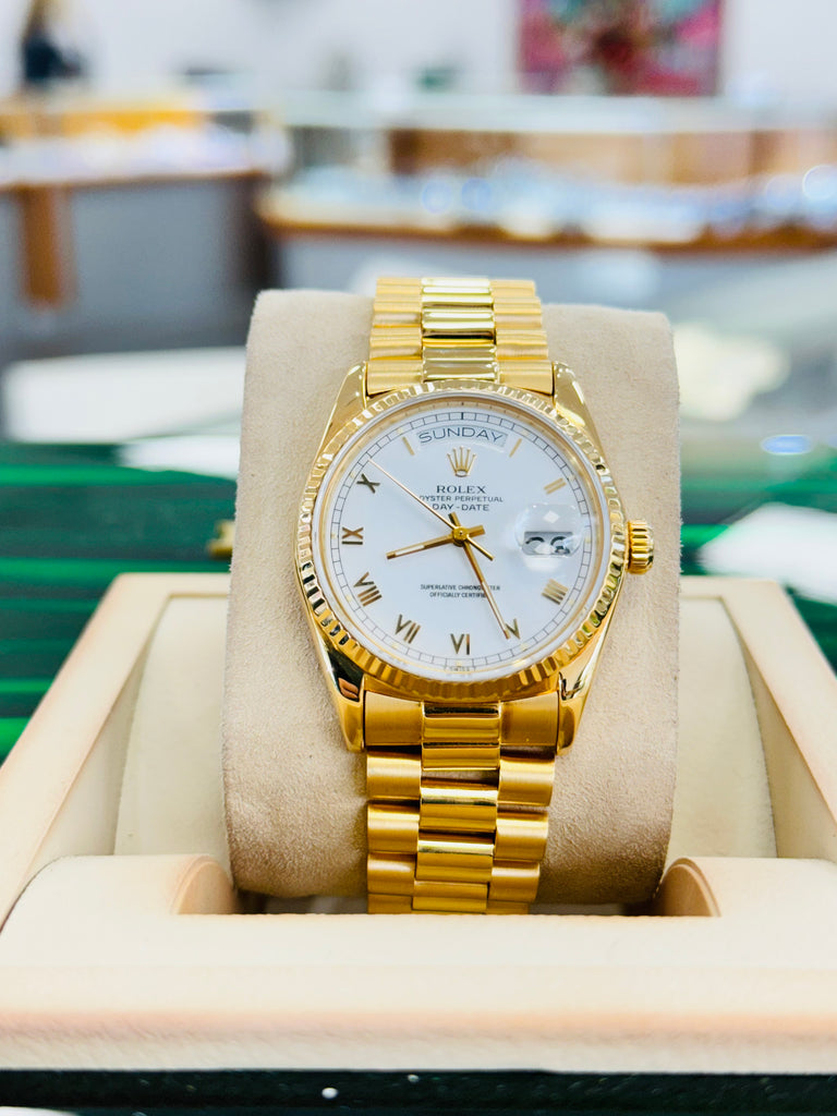 Rolex Day-Date 36 18038  Yellow Gold White Roman Dial PreOwned - Diamonds East Intl.