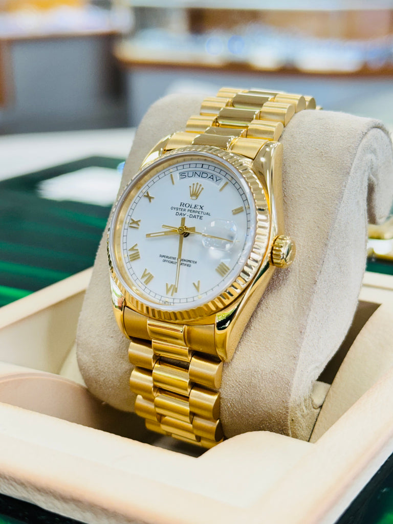 Rolex Day-Date 36 18038  Yellow Gold White Roman Dial PreOwned - Diamonds East Intl.