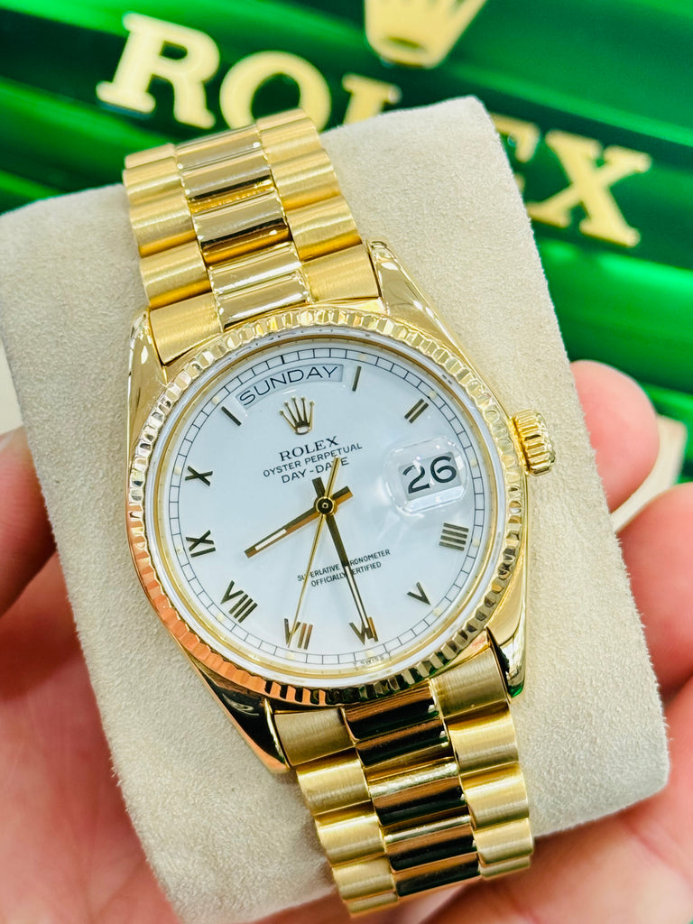 Rolex Day-Date 36 18038  Yellow Gold White Roman Dial PreOwned - Diamonds East Intl.