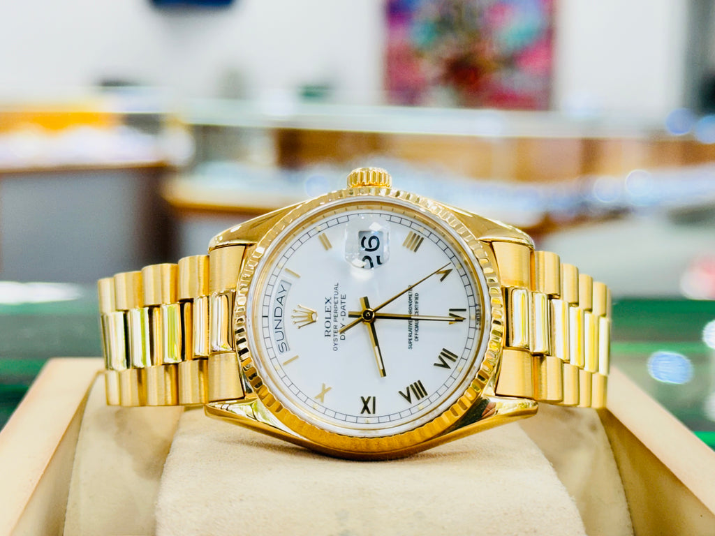 Rolex Day-Date 36 18038  Yellow Gold White Roman Dial PreOwned - Diamonds East Intl.