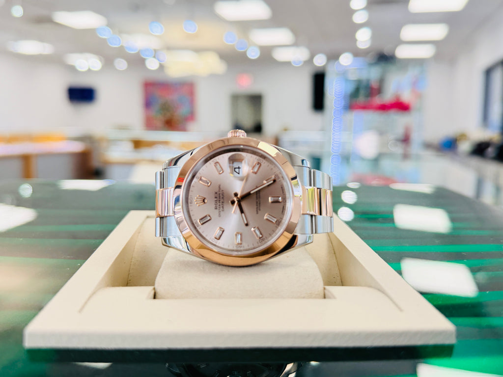 Rolex Datejust 41 126301  Custom Baguette Diamond Sundust Dial Everose & Steel Oyster Band Smooth Bezel PreOwned - Diamonds East Intl.