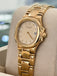 Patek Philippe Nautilus 4700/1j Ladies 26 Ivory Dial Yellow Gold PreOwned - Diamonds East Intl.