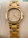 Patek Philippe Nautilus 4700/1j Ladies 26 Ivory Dial Yellow Gold PreOwned - Diamonds East Intl.