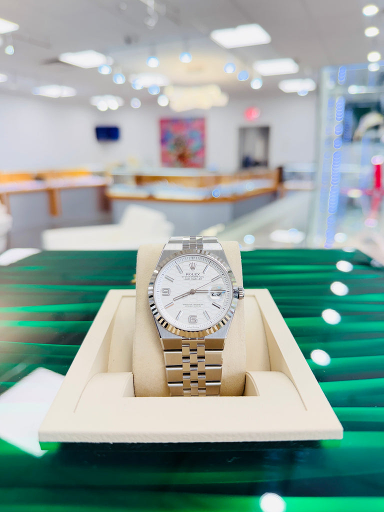 Rolex Land-Dweller 127334 40mm Stainless Steel White Gold Bezel White Honeycomb Dial Box and Papers Unworn