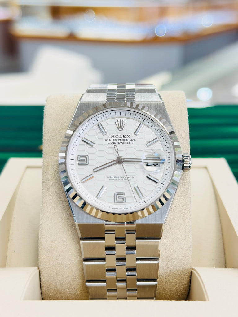 Rolex Land-Dweller 127334 40mm Stainless Steel White Gold Bezel White Honeycomb Dial Box and Papers Unworn