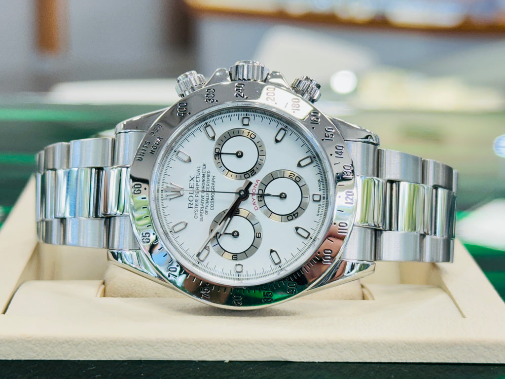 Rolex Daytona 116520  White Dial Chronograph preowned Box and Papers - Diamonds East Intl.