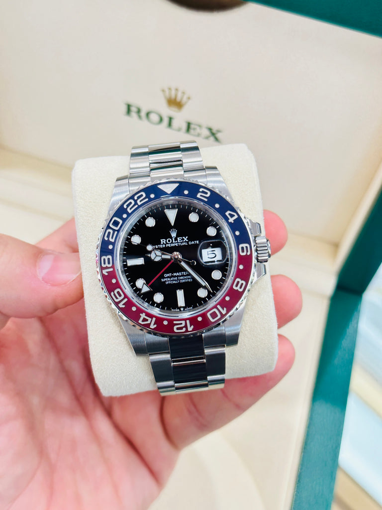 Rolex GMT-Master II  40  “Pepsi” 126710BLRO Oyster Box and Papers PreOwned - Diamonds East Intl.