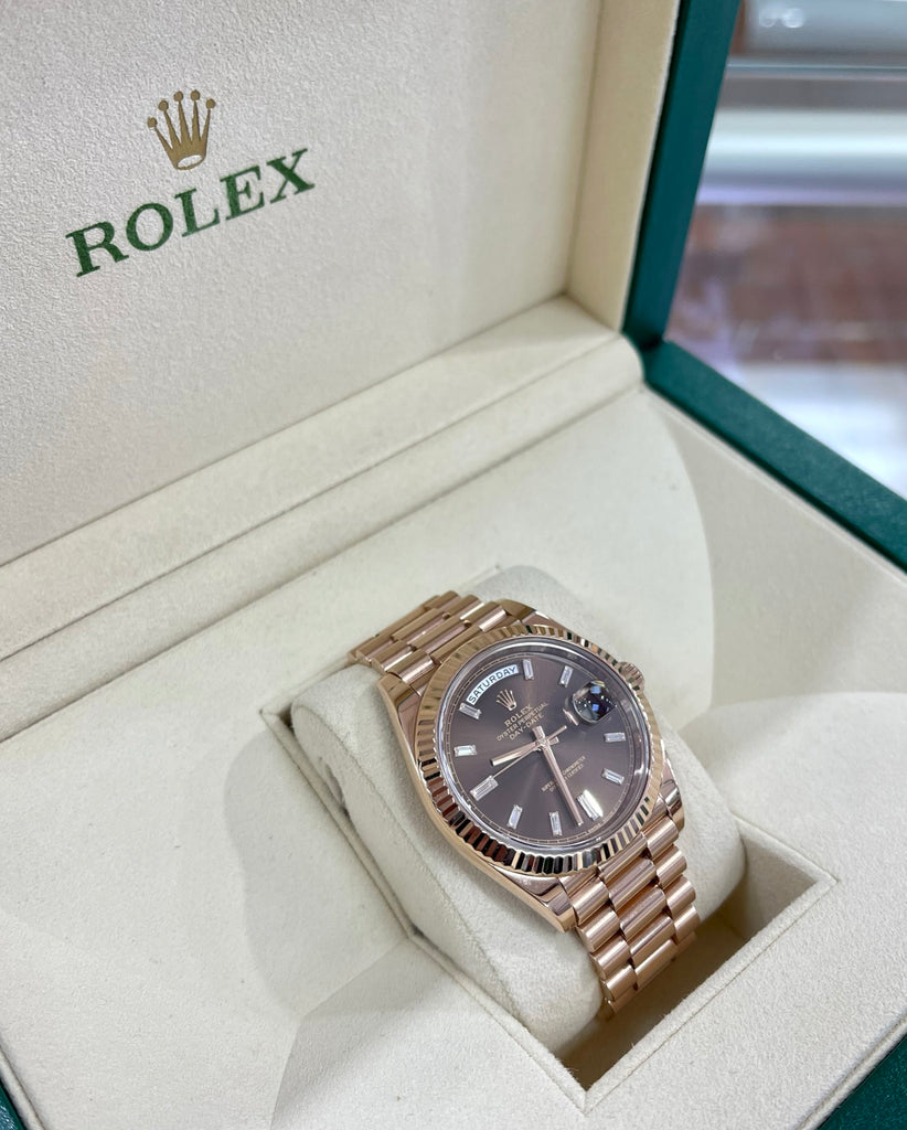 PreOwned Rolex Day-Date 40mm Everrose Gold 228235 Factory Chocolate Baguette Dial Box/Papers