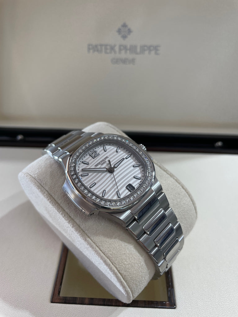 Patek Philippe Nautilus Steel Ladies' Nautilus Steel Silver Wave Dial Factory Diamond Bezel 7018/1A-001 Box and Papers PreOwned - Diamonds East Intl.