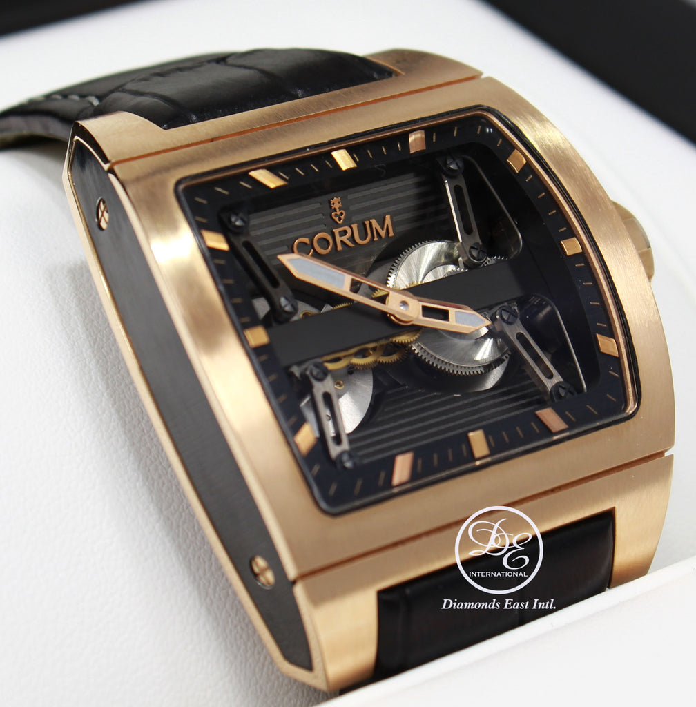  Make: CORUM  Model: 207.201.05/0F01 0000 Includes: The Original Boxes, Papers Were Misplaced. We will include a certified appraisal with the matching serial number.  Condition: Pre owned, MINT CONDITION. WAS FULLY SERVICED BY Corum.    Movement: Automatic Movement Water-Resistance: 100 Meters/ 330 feet Material:  18k Rose Gold  Case Size: 52mm X 42mm Crystal: Sapphire Crystal (Scratch Resistant) Dial: Skeleton Dial with Center Bridge Bracelet: Black Leather Band  Clasp:  18k Rose Gold Deployment Buckle 