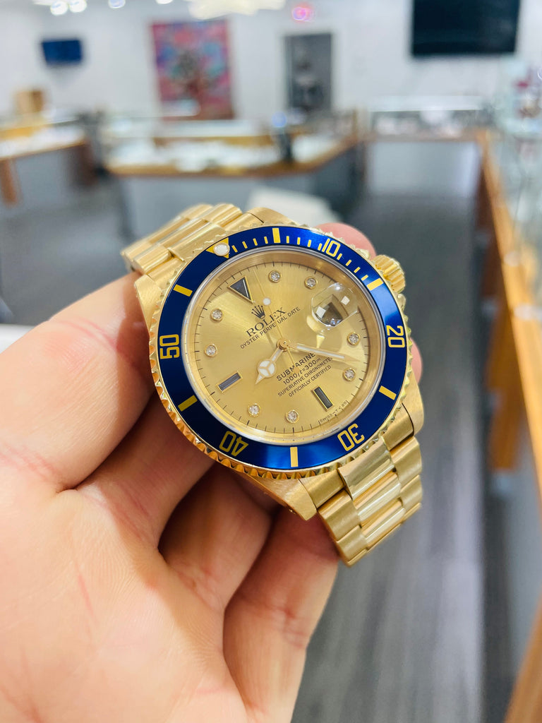 Rolex - Submariner Date Gold with Serti Dial