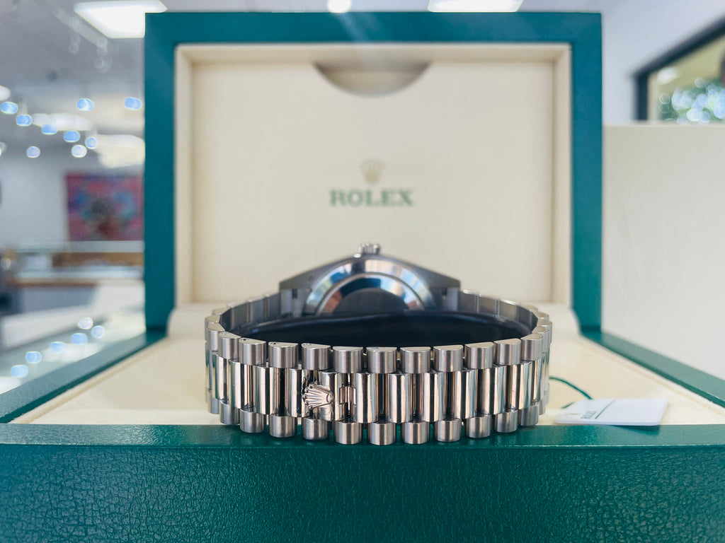 Rolex White Gold Day-Date 228239 40 Factory Black Diamond baguettes Dial B/P PreOwned - Diamonds East Intl.