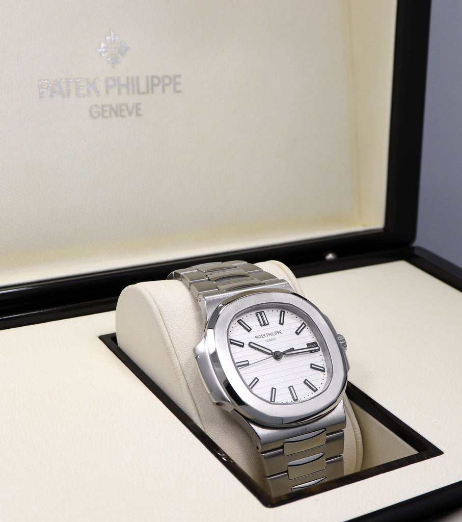 PATEK PHILIPPE Nautilus 5711/1A-01 White Dial Watch Box Papers Mint Condition - Diamonds East Intl.