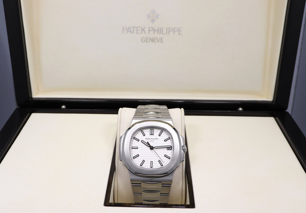 PATEK PHILIPPE Nautilus 5711/1A-01 White Dial Watch Box Papers Mint Condition - Diamonds East Intl.