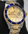 Rolex Submariner 16613 18k Yellow Gold/SS Blue Sapphires & Diamonds Dial - Diamonds East Intl.