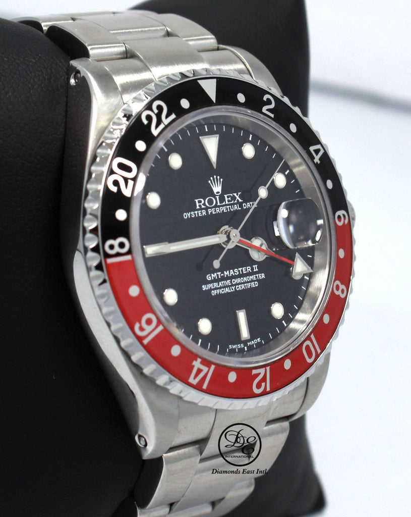 Rolex GMT MASTER II COKE 16710 BLACK/RED 40mm Steel Oyster Watch - Diamonds East Intl.